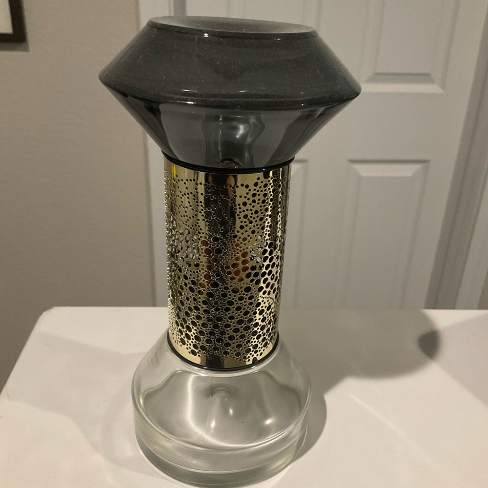 Diptyque Black and Gold Candle Holder with Modern Design